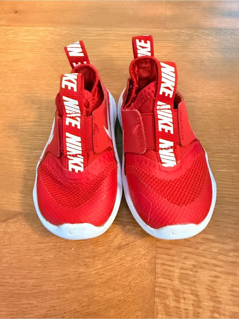 Nike Kids Red Slip-On Sneakers with White Swoosh